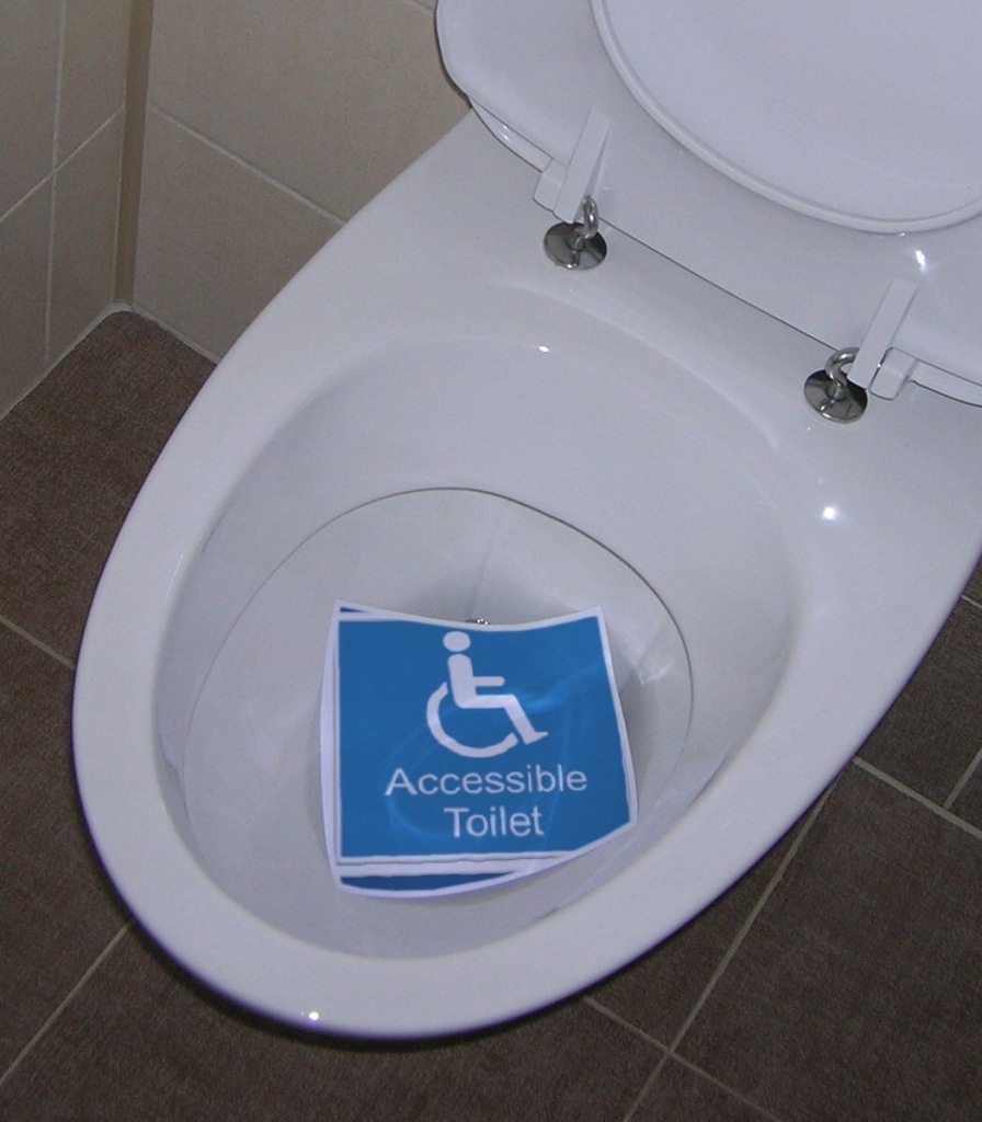 Accessible toilet symbol at the bottom of a toilet.